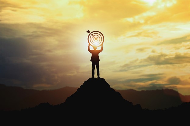 The Interplay Between Accomplishing Goals and Shaping Self-Identity